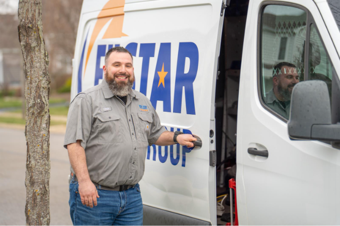 Five Star Home Services plumber standing beside a service van, helping homeowners improve Ohio water quality.