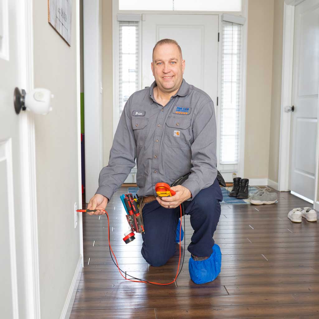 Electrical Outlets | Five Star Home Services tech with outlet