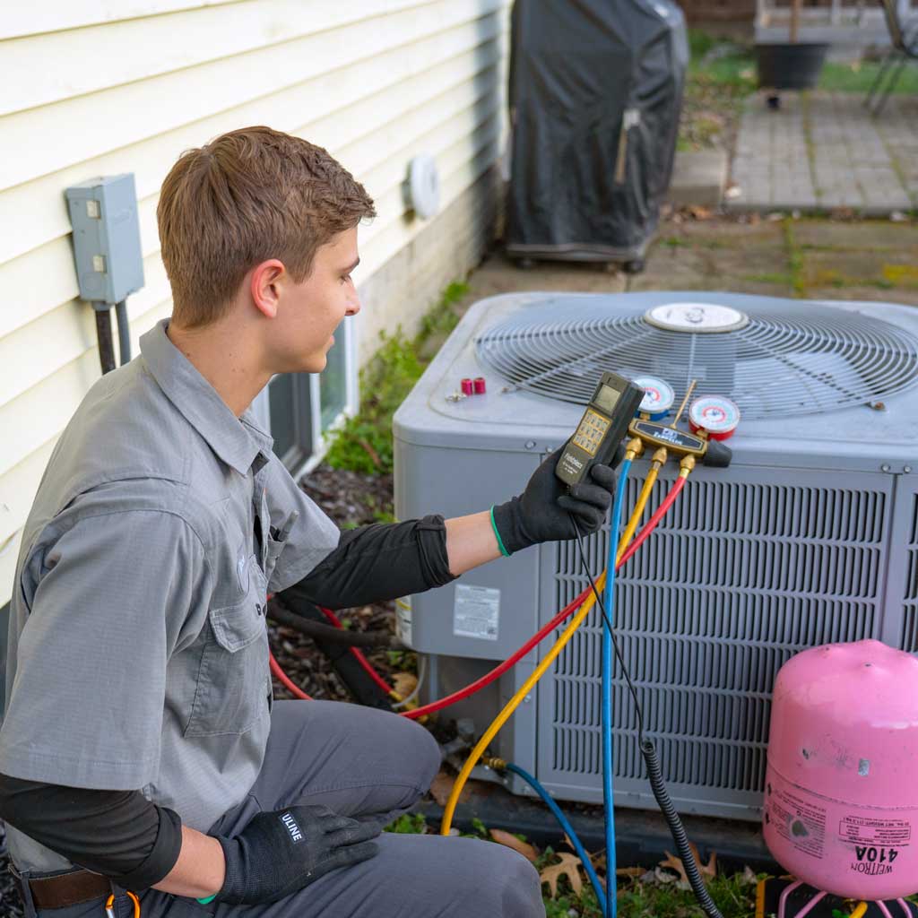AC Maintenance | Five Star Home Services tech with ac