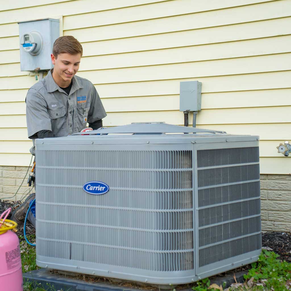 AC Services | Five Star Home Services tech with ac