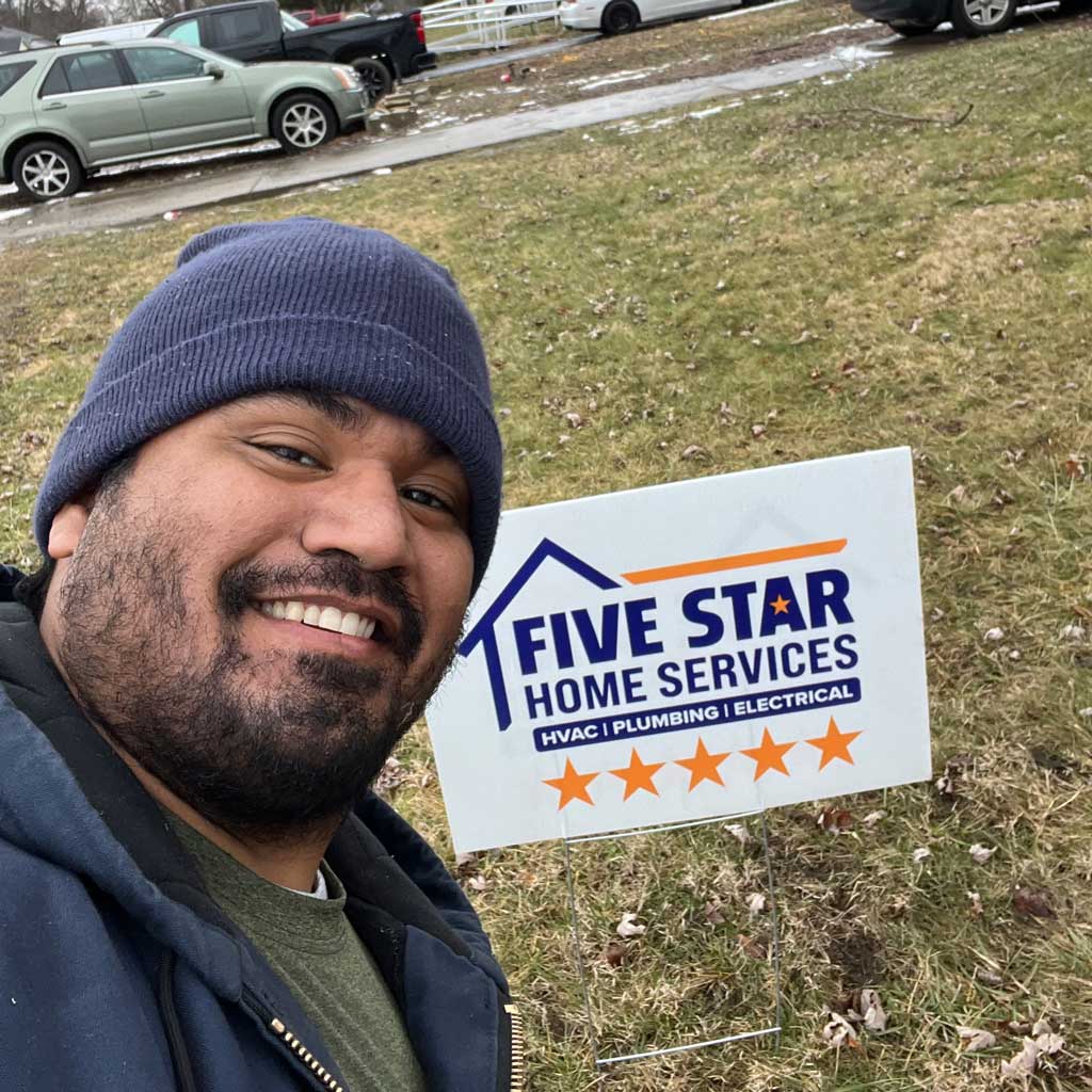 tech with yard sign