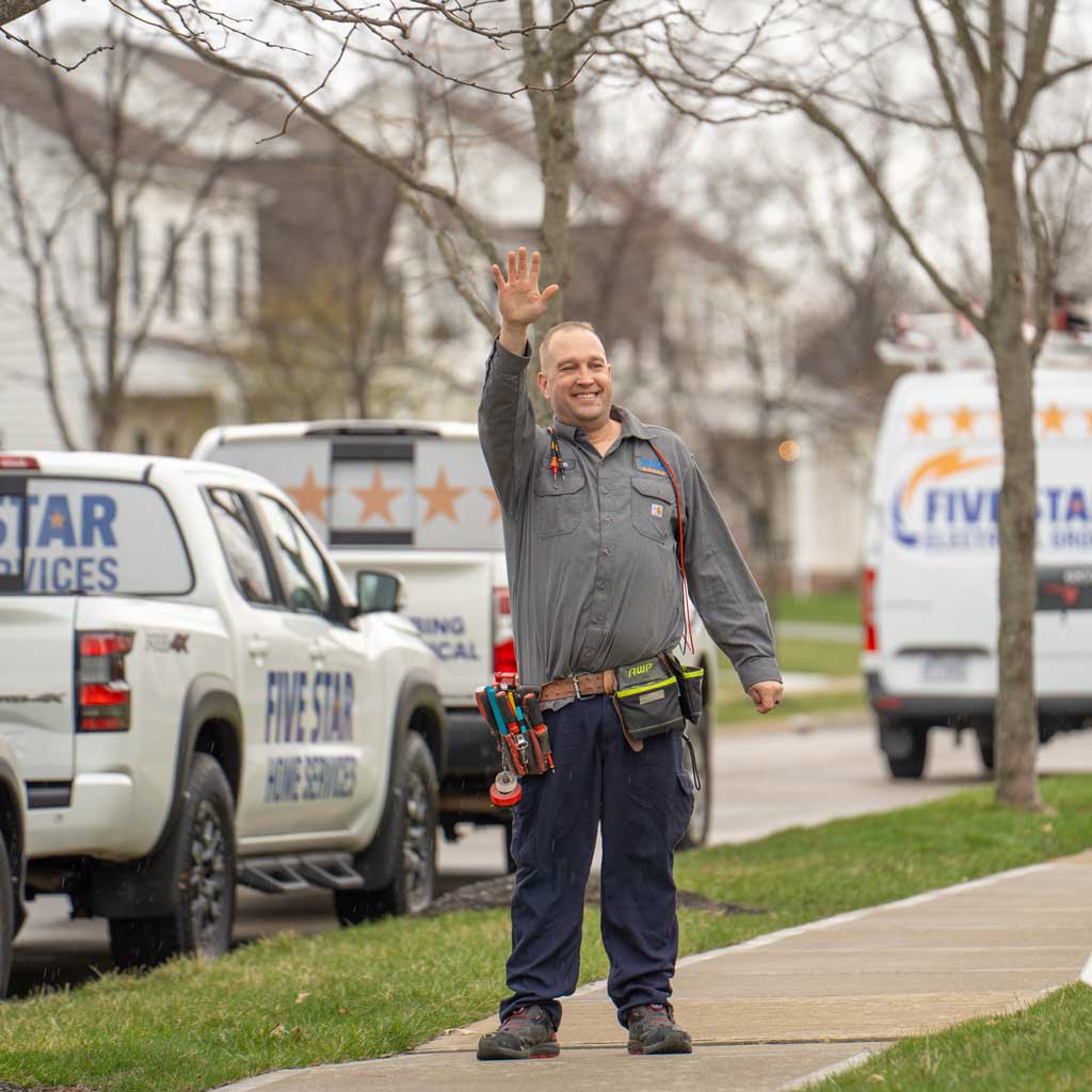 Five Star Home Services tech waving