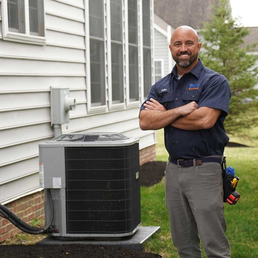 HVAC Installation | Five Star Home Services Tech next to ac