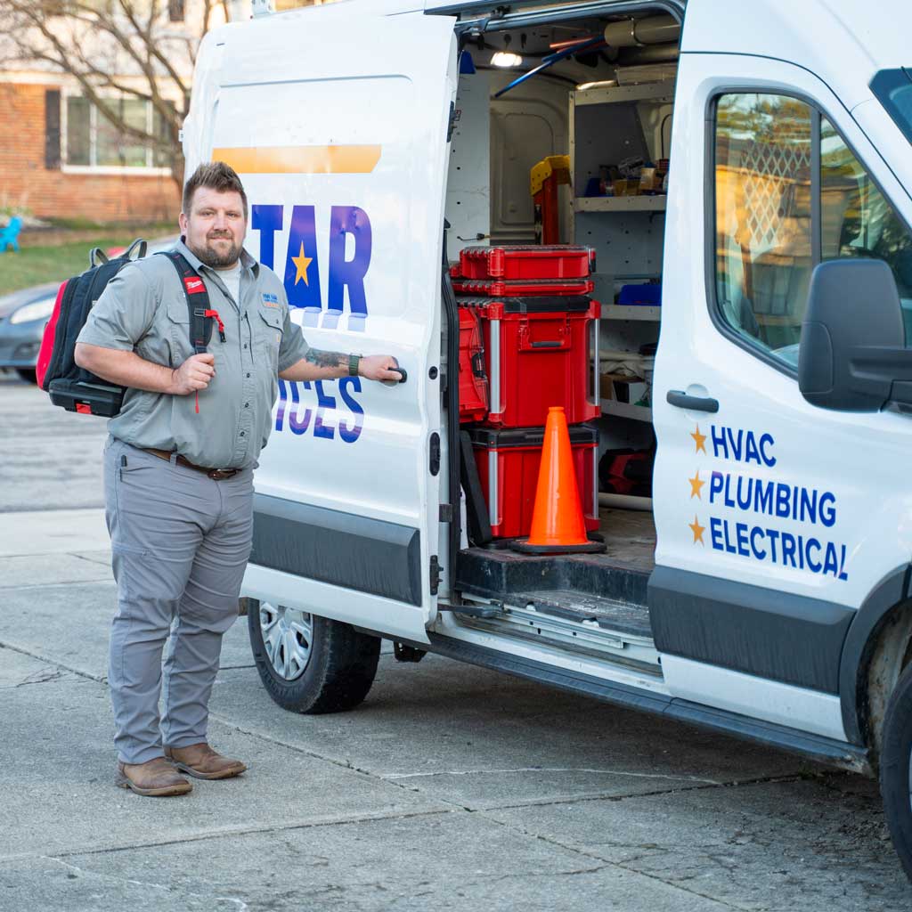 tech next to van