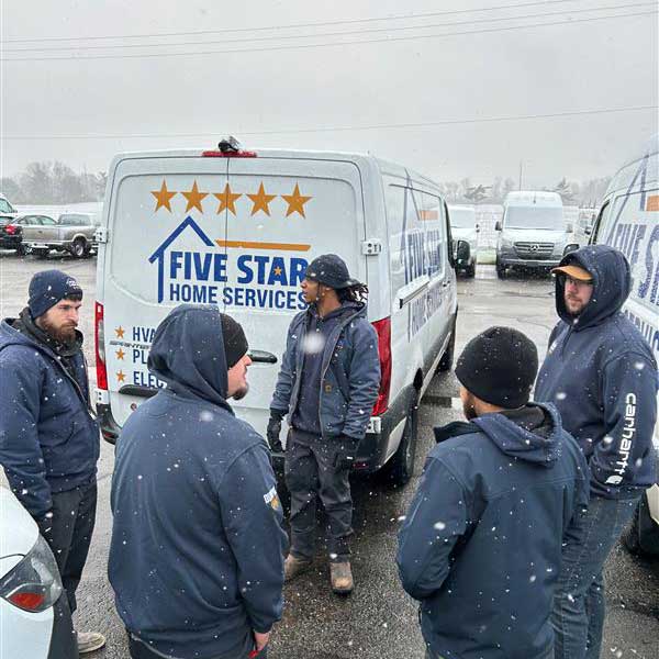 Technicians in the snow