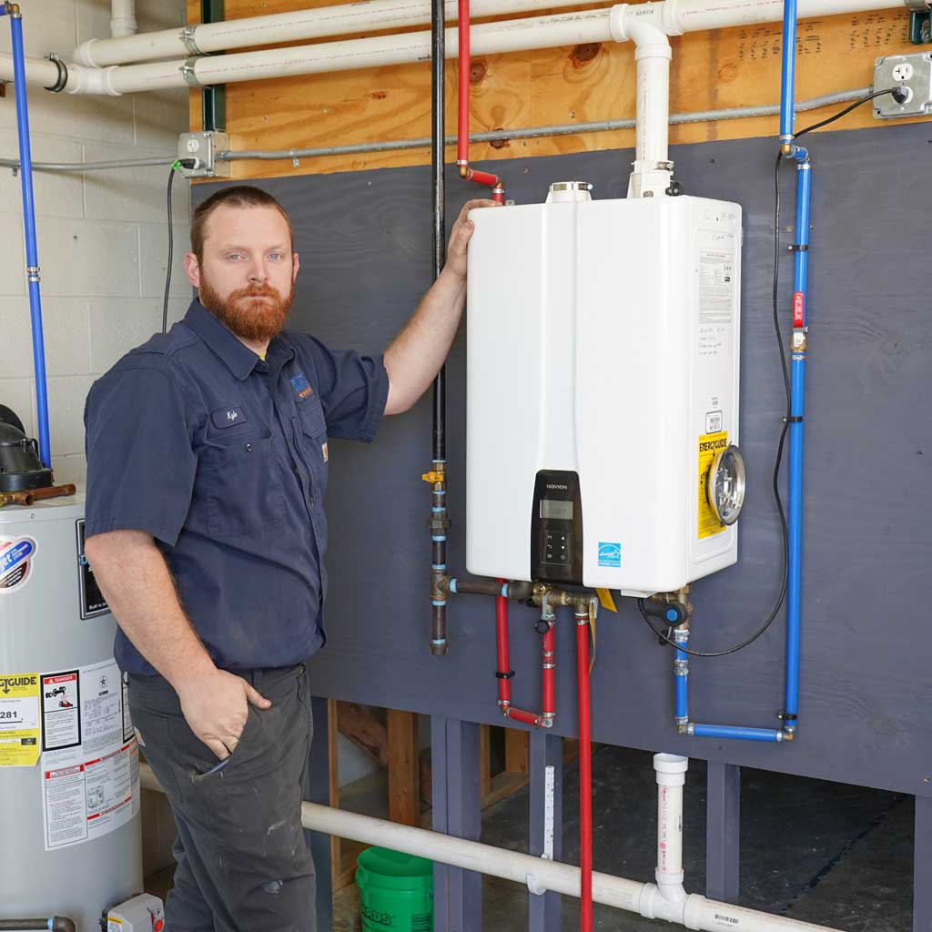 tech with tankless water heater
