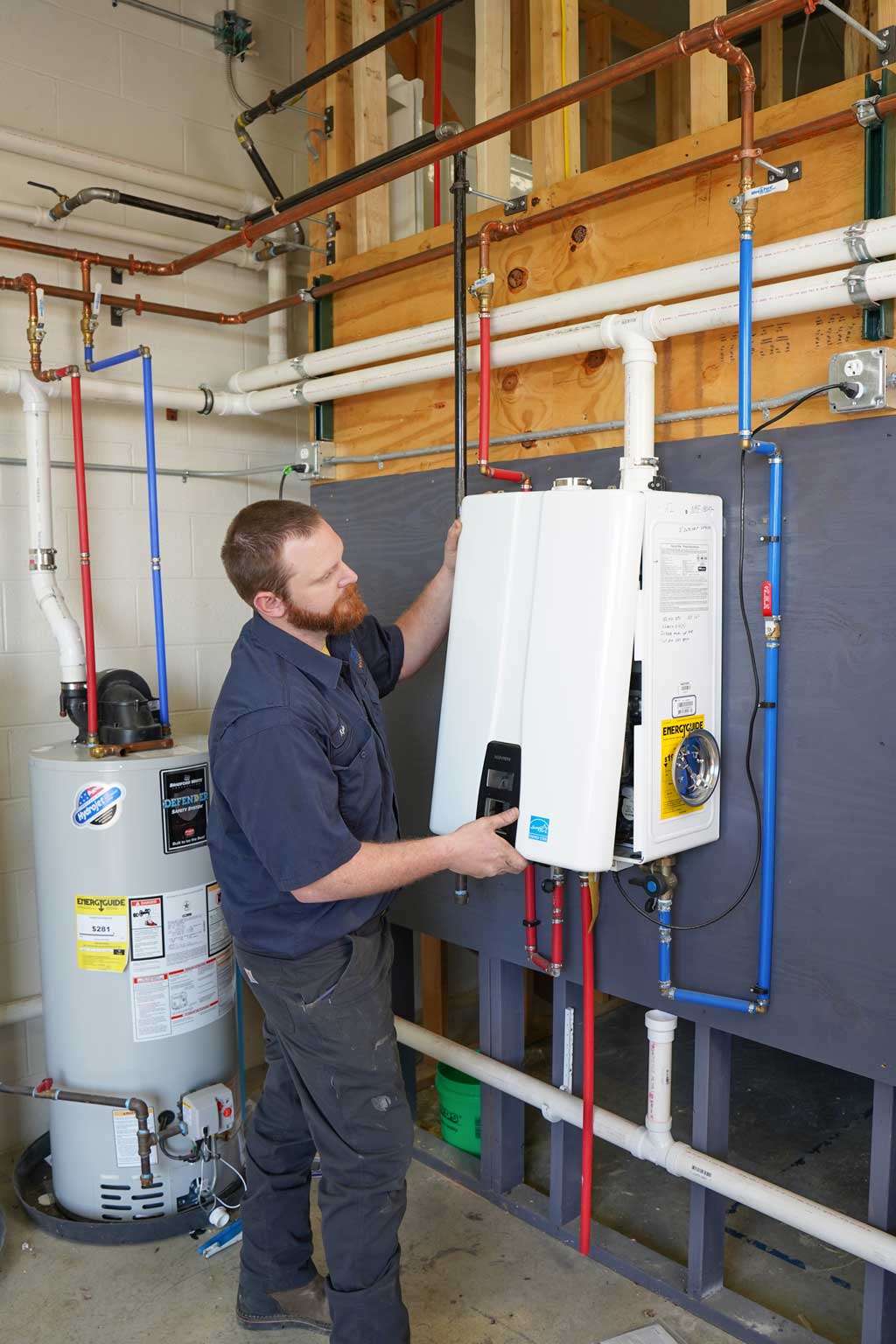 tech with tankless water heater