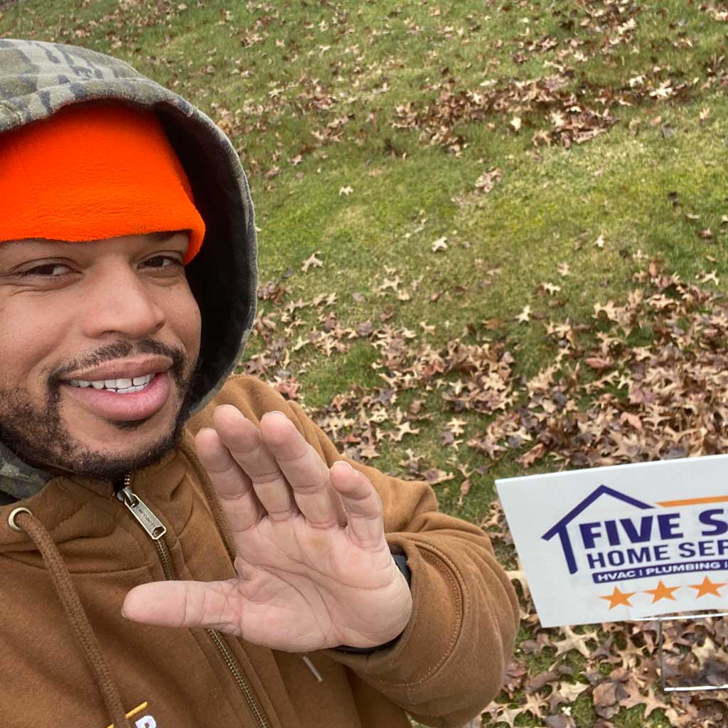 tech with yard sign