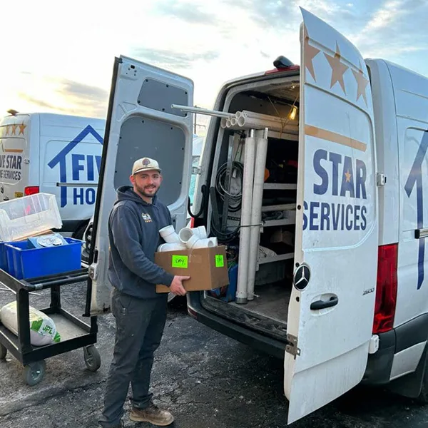 putting supplies in a truck