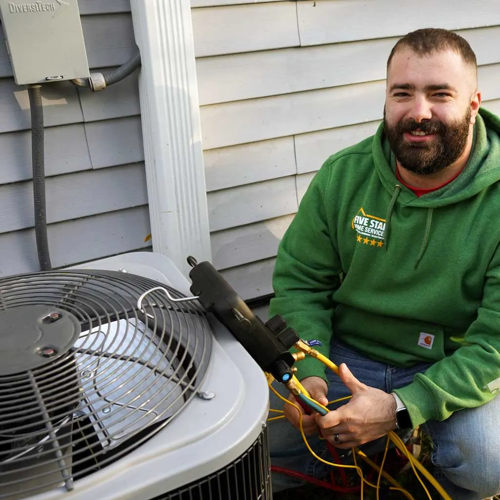 technician with an air conditioner